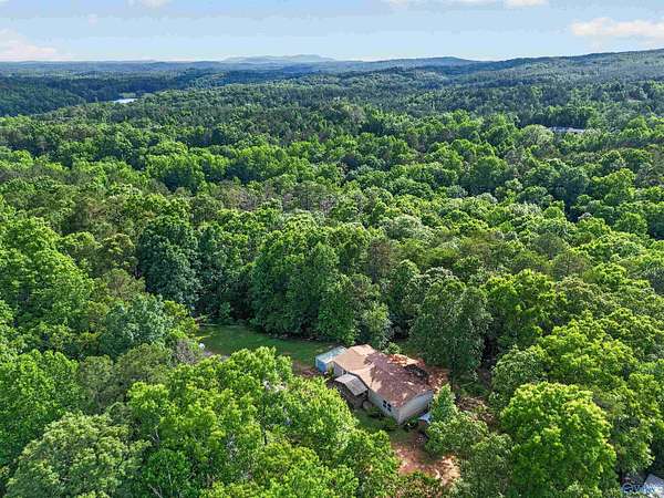 9.25 Acres of Land with Home for Sale in Heflin, Alabama