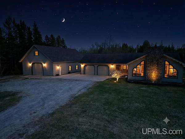 40 Acres of Recreational Land with Home for Sale in Garden, Michigan