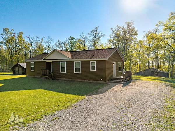 5 Acres of Land with Home for Sale in Hillman, Michigan