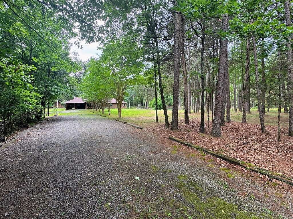 5.82 Acres of Land with Home for Sale in Russellville, Arkansas
