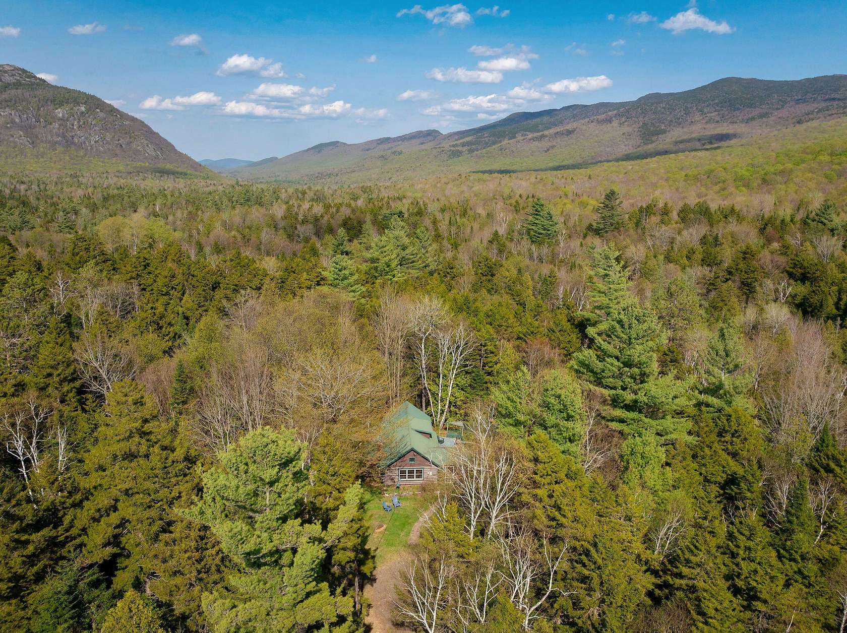 27.9 Acres of Recreational Land with Home for Sale in Black Brook, New York