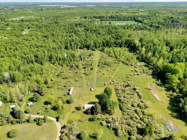 10 Acres of Recreational Land with Home for Sale in Grant, Michigan
