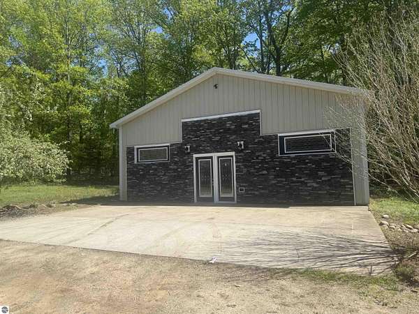 2 Acres of Land with Home for Sale in Alden, Michigan