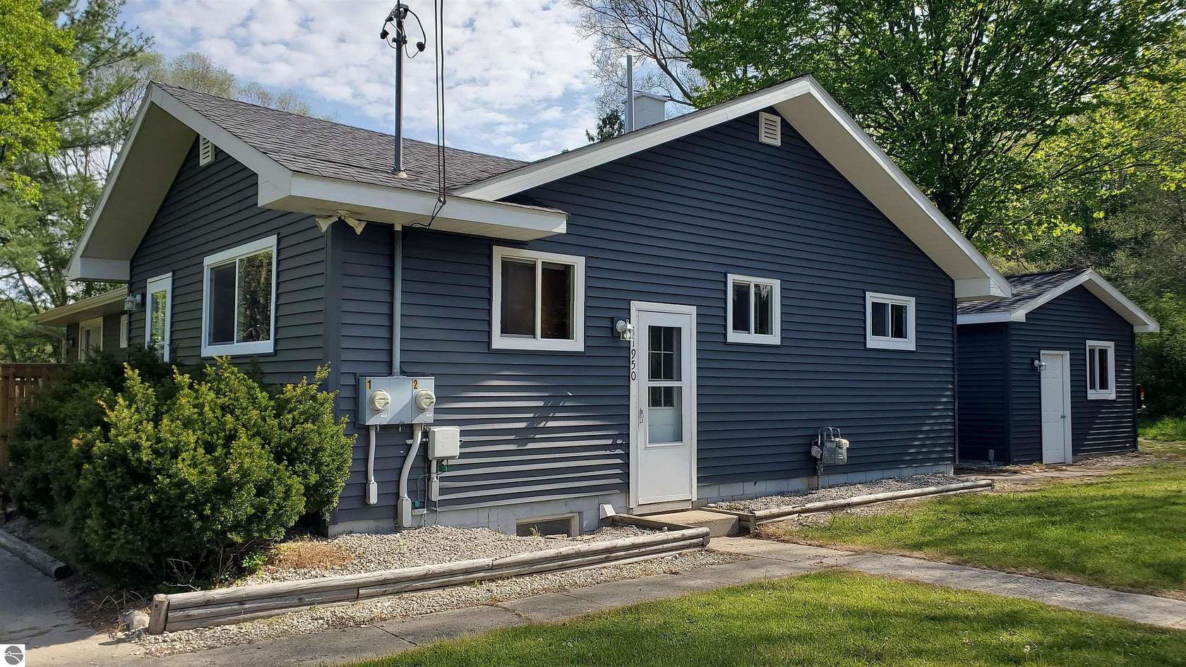 3.3 Acres of Improved Mixed-Use Land for Sale in Honor, Michigan
