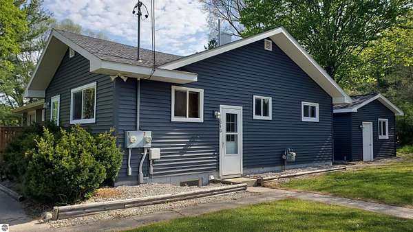 3.3 Acres of Improved Mixed-Use Land for Sale in Honor, Michigan