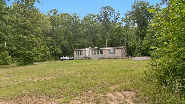 21.3 Acres of Recreational Land with Home for Sale in Dunlap, Tennessee