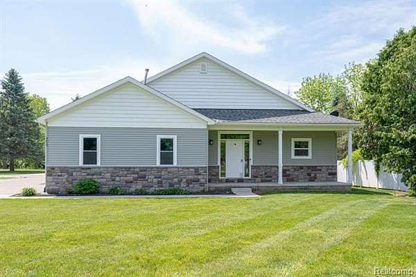 1.8 Acres of Land with Home for Sale in Oceola Township, Michigan