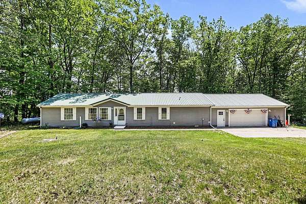 10 Acres of Land with Home for Sale in Free Soil, Michigan