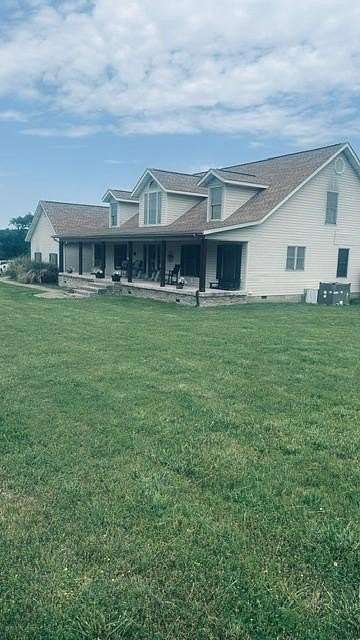 9.1 Acres of Land with Home for Sale in Gentry, Arkansas