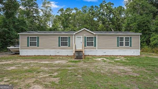 4.19 Acres of Land with Home for Sale in Jesup, Georgia