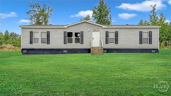 9.7 Acres of Land with Home for Sale in Chauncey, Georgia