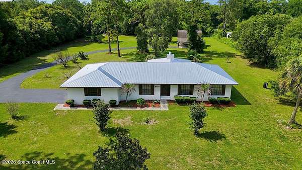 2.22 Acres of Land with Home for Sale in Mims, Florida