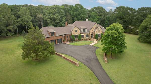 4.45 Acres of Land with Home for Sale in Eads, Tennessee