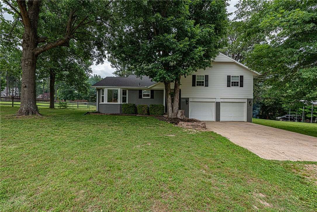 1.5 Acres of Land with Home for Sale in Fayetteville, Arkansas
