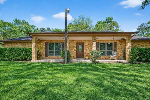 2 Acres of Land with Home for Sale in Pinehurst, Texas