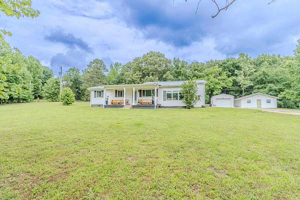 6.87 Acres of Land with Home for Sale in Paragould, Arkansas