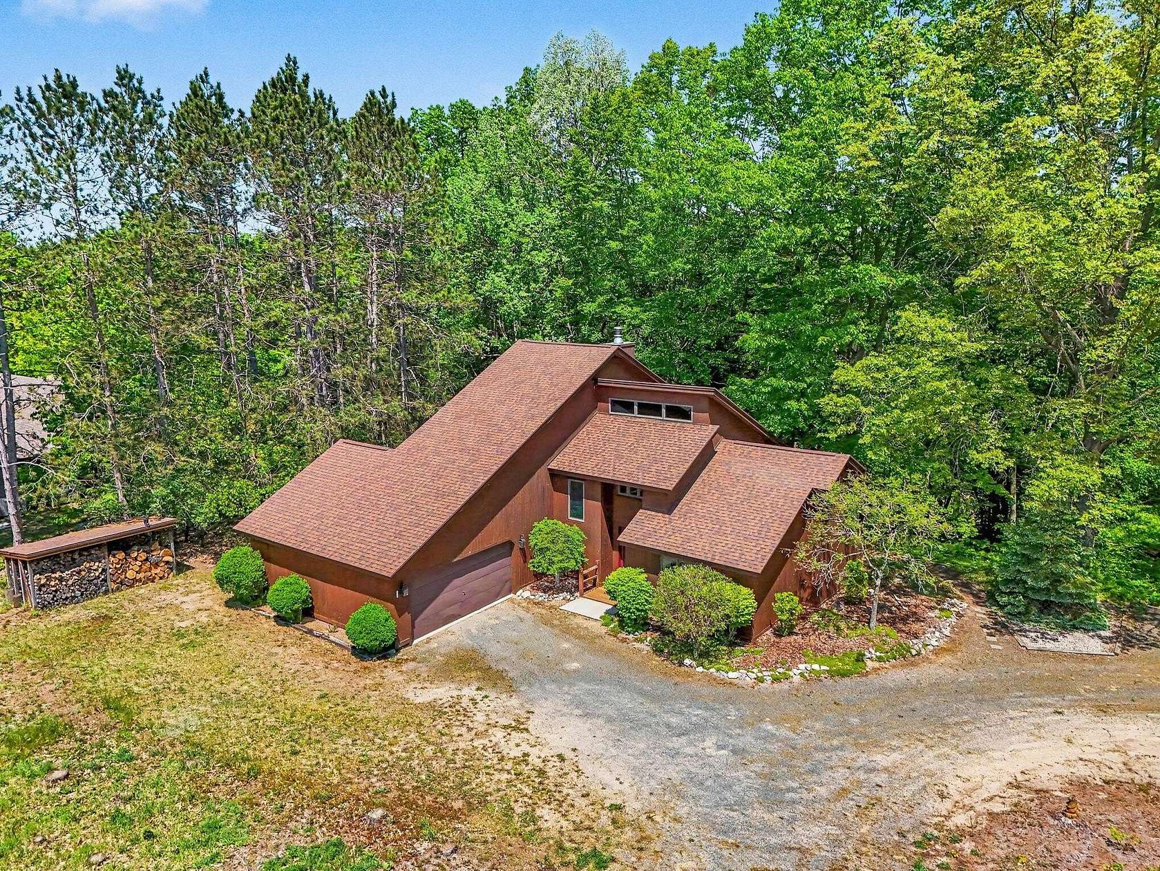 15.4 Acres of Land with Home for Sale in Scottville, Michigan