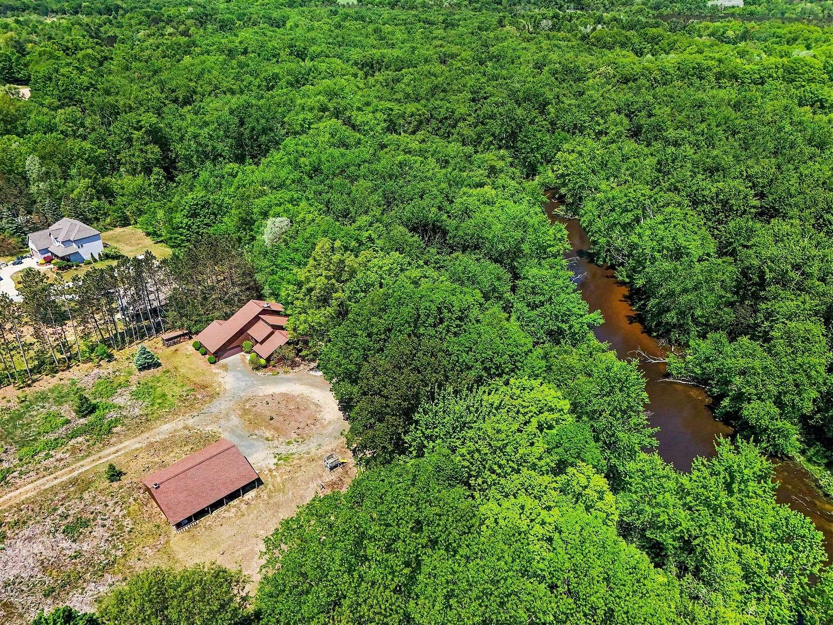 15.4 Acres of Land with Home for Sale in Scottville, Michigan