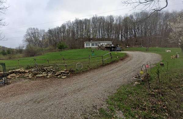 8 Acres of Land with Home for Auction in Chandlersville, Ohio