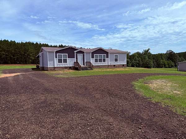 1.52 Acres of Land with Home for Sale in Many, Louisiana