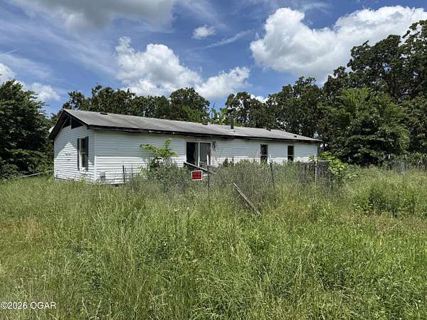 3 Acres of Land with Home for Sale in Goodman, Missouri