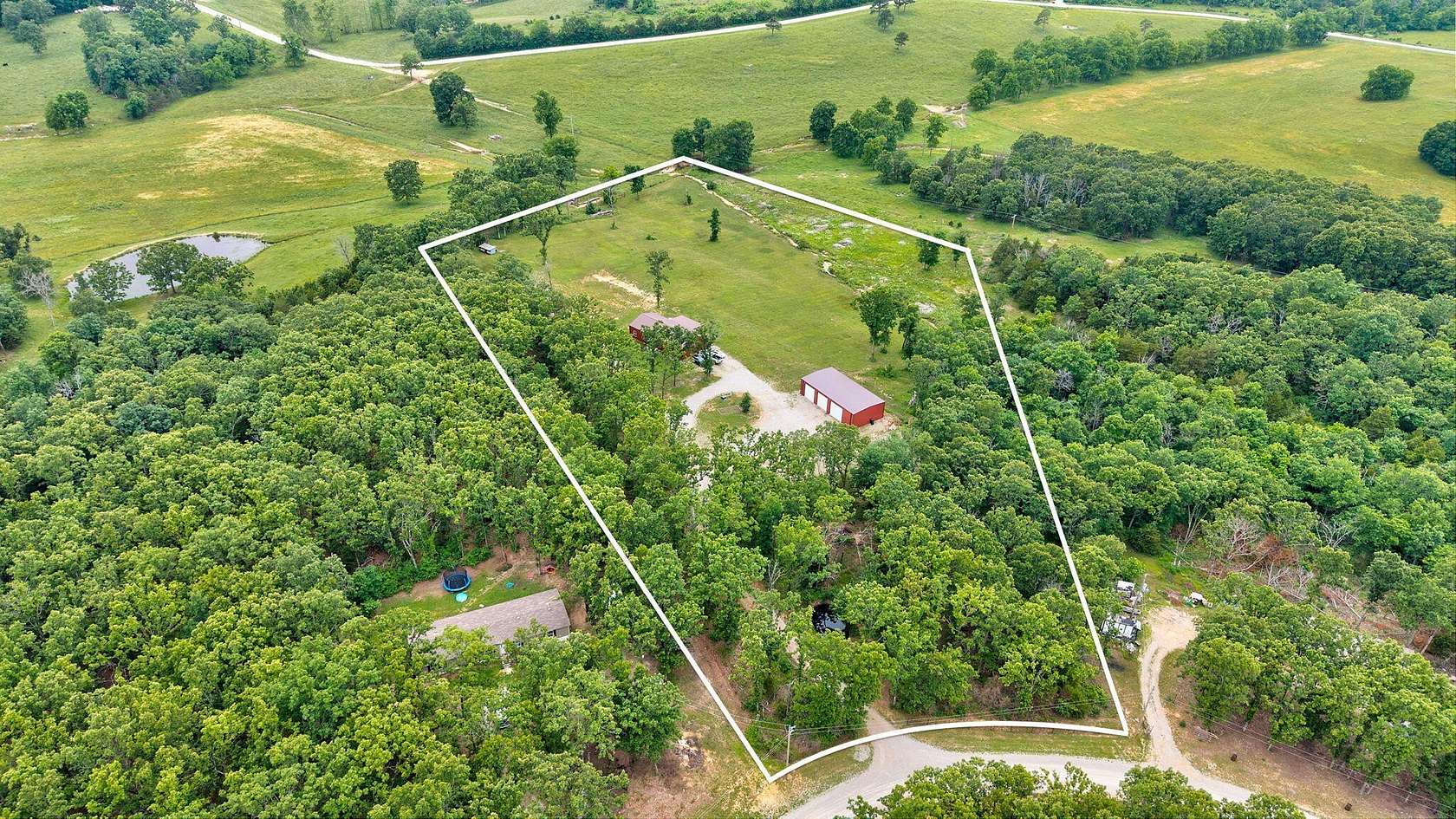 7.19 Acres of Land with Home for Sale in Conway, Missouri