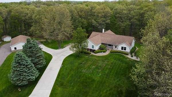4.34 Acres of Land with Home for Sale in Highland Township, Michigan