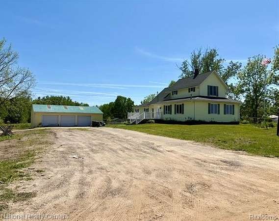 10 Acres of Land with Home for Sale in Conway Township, Michigan
