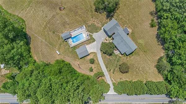 3 Acres of Land with Home for Sale in Millers Creek, North Carolina