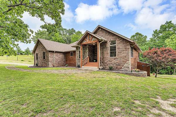 9.66 Acres of Land with Home for Sale in Ozark, Missouri