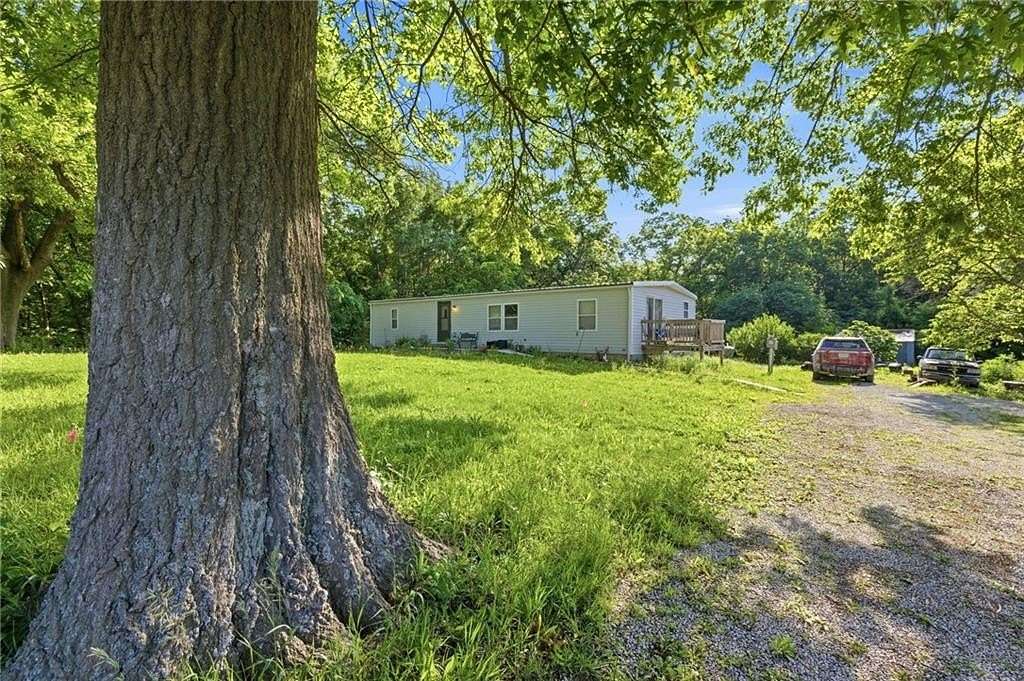 20 Acres of Recreational Land with Home for Sale in Harrisonville, Missouri