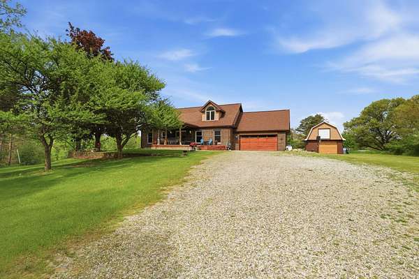10.6 Acres of Land with Home for Sale in Goodrich, Michigan