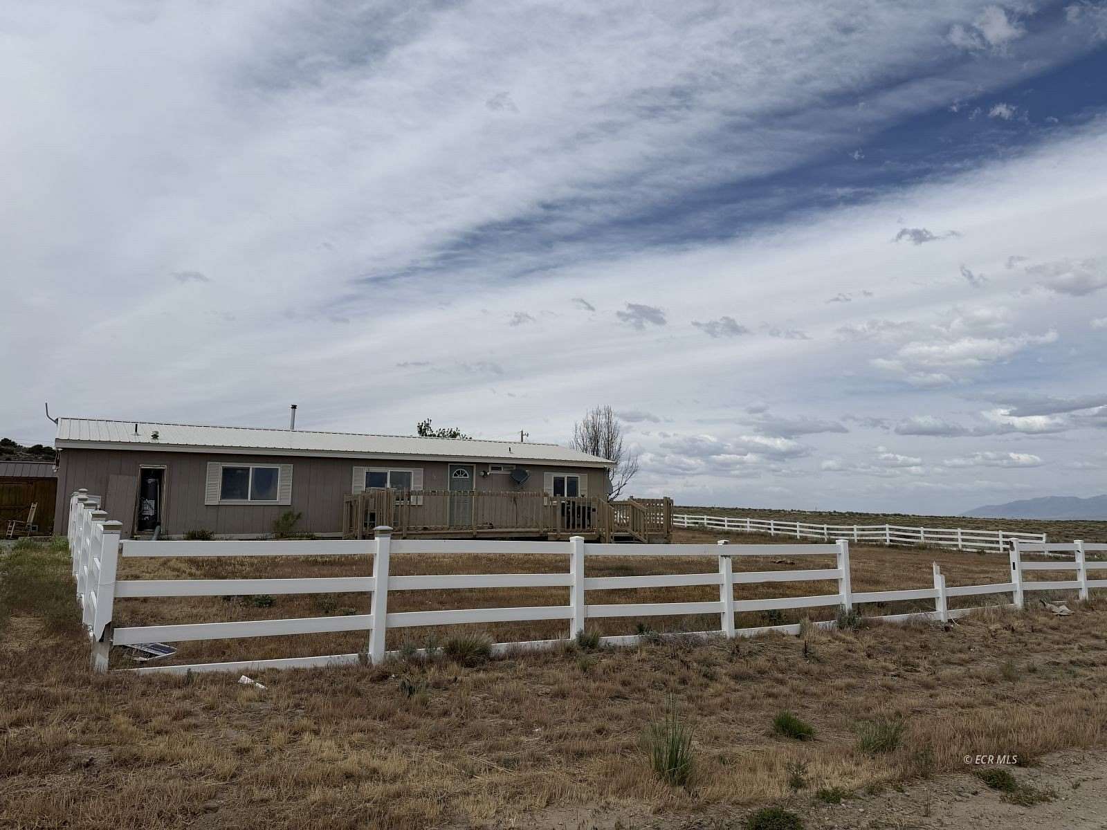 2 Acres of Land with Home for Sale in Spring Creek, Nevada