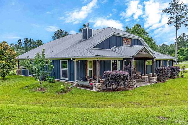 9.14 Acres of Land with Home for Sale in Milton, Florida