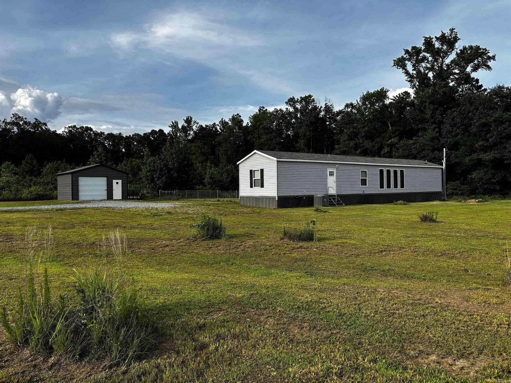 7 Acres of Land with Home for Sale in Star City, Arkansas