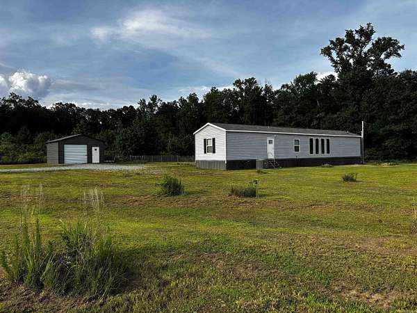7 Acres of Land with Home for Sale in Star City, Arkansas