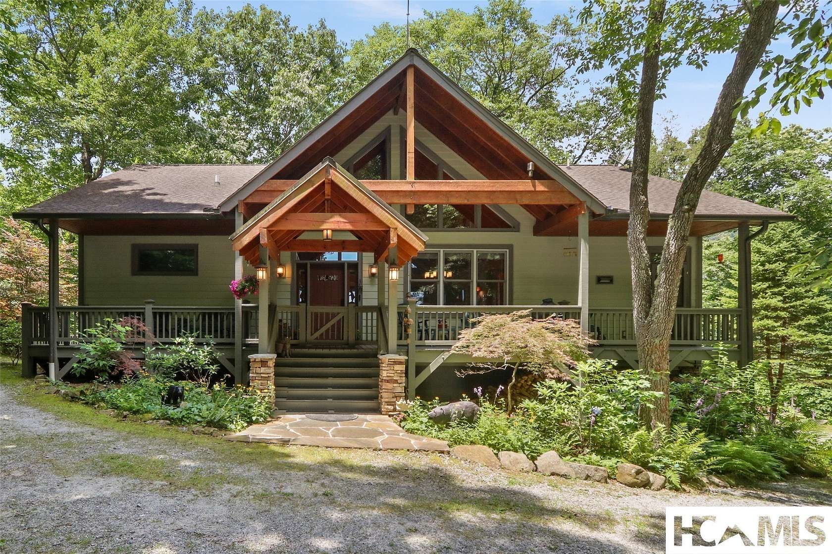 4.58 Acres of Land with Home for Sale in Scaly Mountain, North Carolina