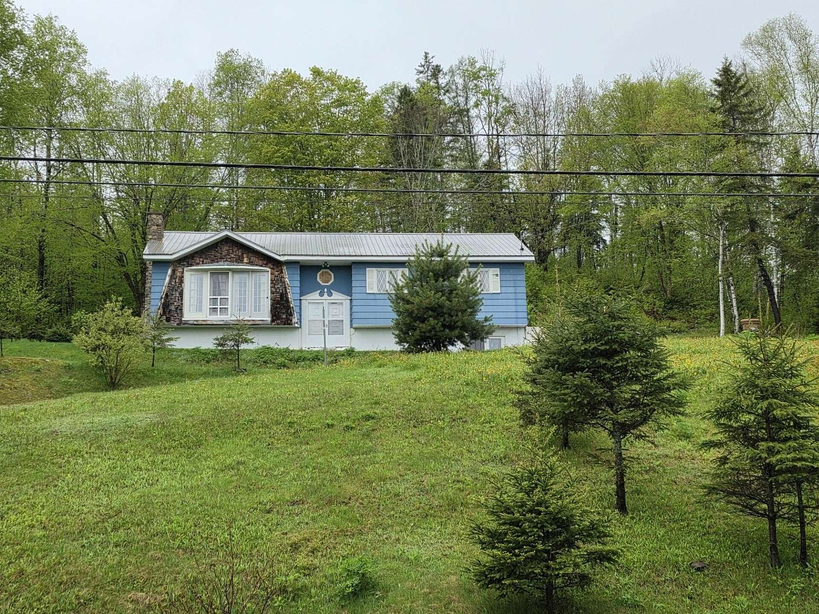 1.5 Acres of Land with Home for Sale in Saint Agatha, Maine