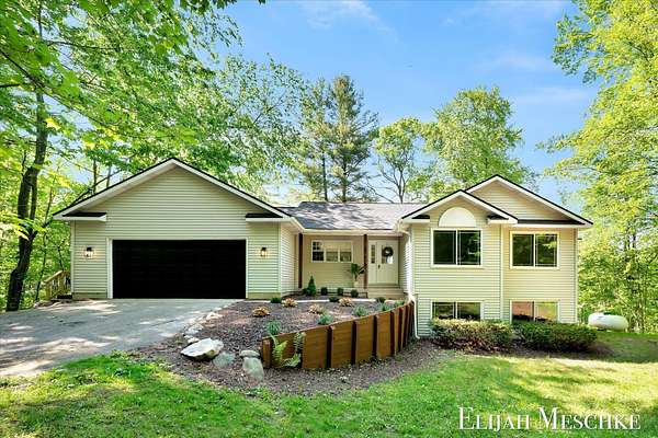 9.26 Acres of Land with Home for Sale in Cedar Springs, Michigan