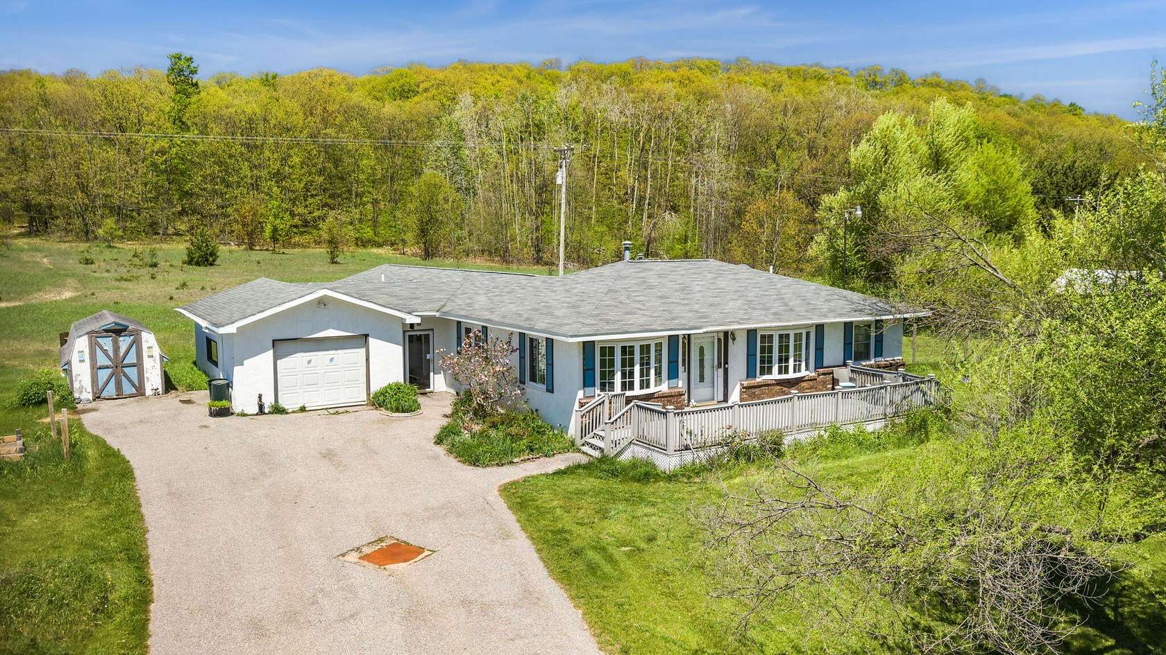 3 Acres of Land with Home for Sale in Vanderbilt, Michigan