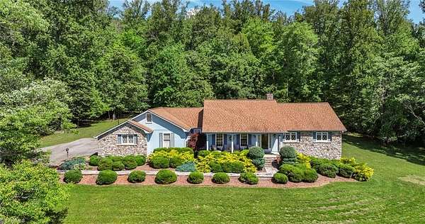 43.6 Acres of Recreational Land with Home for Sale in Purlear, North Carolina