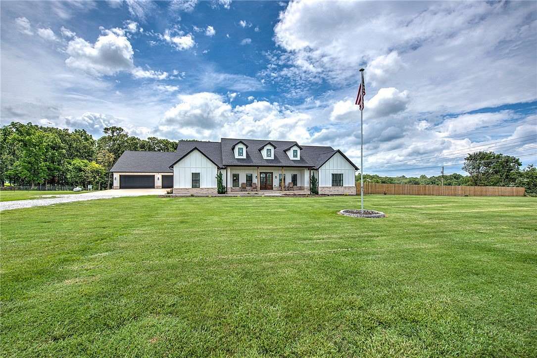 4 Acres of Land with Home for Sale in Gravette, Arkansas