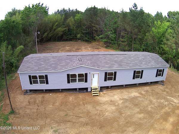 7.7 Acres of Land with Home for Sale in Byhalia, Mississippi