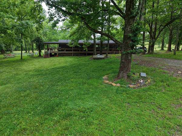 12.5 Acres of Land with Home for Sale in Cove, Arkansas