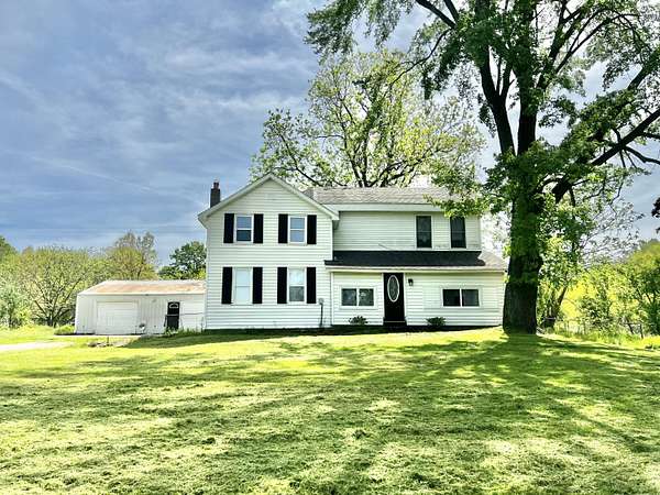 20 Acres of Land with Home for Sale in Albion, Michigan