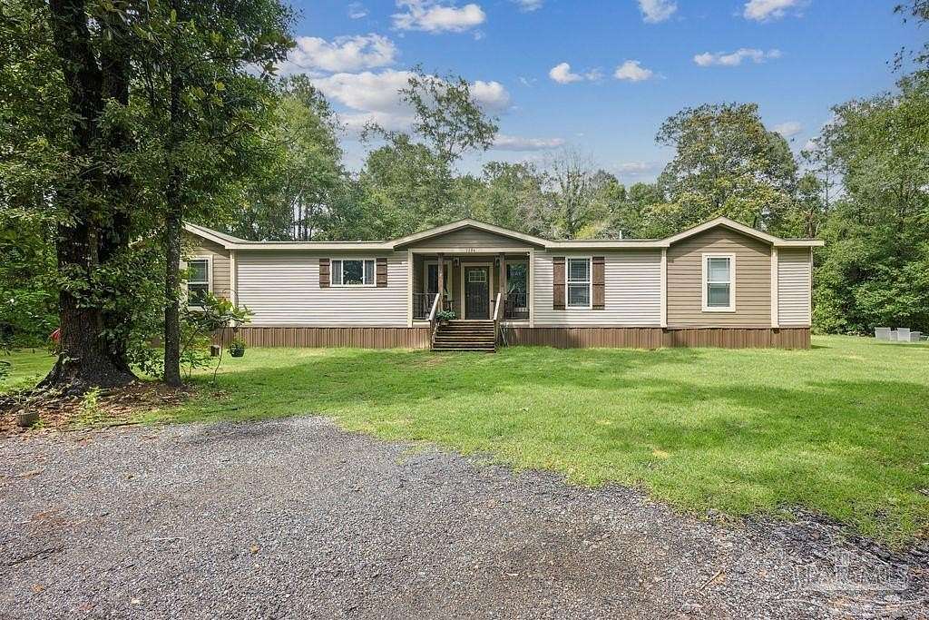 2.4 Acres of Land with Home for Sale in Molino, Florida