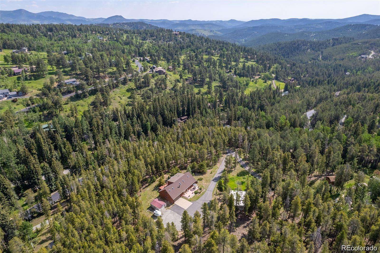 4 Acres of Land with Home for Sale in Evergreen, Colorado