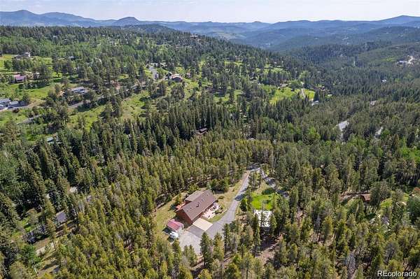 4 Acres of Land with Home for Sale in Evergreen, Colorado