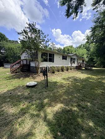 1.82 Acres of Land with Home for Sale in La Vergne, Tennessee