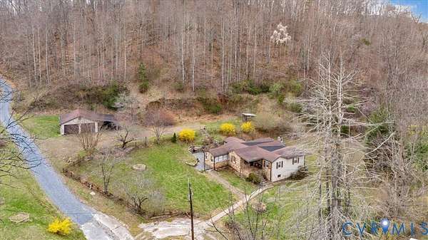 10.7 Acres of Land with Home for Auction in Big Island, Virginia